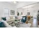 Bright living room featuring a comfy sofa and stylish decor at 2601 N 19Th St, Tampa, FL 33605