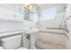 Clean bathroom with walk-in shower and grab bars at 7903 Hyde Park Ave, North Port, FL 34287