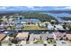 Bird's-eye view of a waterfront community with canals and numerous houses at 9841 San Sebastian Way, Port Richey, FL 34668