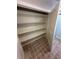 Bathroom linen closet with multiple shelves at 9841 San Sebastian Way, Port Richey, FL 34668