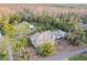 House nestled in a wooded area with a spacious yard at 17307 Linda Vista Cir, Lutz, FL 33548