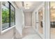 Bright bathroom with built in shelving and mirrors at 17307 Linda Vista Cir, Lutz, FL 33548
