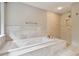 Spa-like bathroom featuring a soaking tub and shower at 17307 Linda Vista Cir, Lutz, FL 33548