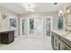 Large bathroom with double vanity and walk-in shower at 17307 Linda Vista Cir, Lutz, FL 33548