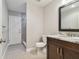 Clean bathroom with marble vanity and shower at 17307 Linda Vista Cir, Lutz, FL 33548
