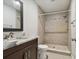 Updated bathroom with a walk-in shower, new vanity, and modern fixtures at 17307 Linda Vista Cir, Lutz, FL 33548