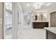 Elegant Primary bathroom with double vanity and large walk-in closet at 17307 Linda Vista Cir, Lutz, FL 33548