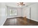 Bedroom with hardwood floors and closet access at 17307 Linda Vista Cir, Lutz, FL 33548