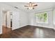 Bright bedroom with hardwood floors and bathroom access at 17307 Linda Vista Cir, Lutz, FL 33548