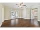 Bright bedroom with hardwood floors and French doors leading outside at 17307 Linda Vista Cir, Lutz, FL 33548