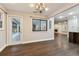 Casual dining area with pool view and hardwood floors at 17307 Linda Vista Cir, Lutz, FL 33548
