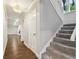 Bright hallway with wood-look flooring and access to living spaces at 17307 Linda Vista Cir, Lutz, FL 33548