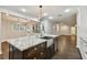 Eat-in kitchen with large island and stainless steel appliances at 17307 Linda Vista Cir, Lutz, FL 33548