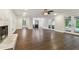 Spacious living room with pool view and hardwood floors at 17307 Linda Vista Cir, Lutz, FL 33548