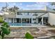 Home's backyard features a refreshing pool with ample patio space at 17307 Linda Vista Cir, Lutz, FL 33548