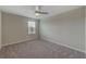 Spacious bedroom with carpeted floor and ceiling fan at 11321 Alachua Creek Ln, Riverview, FL 33579