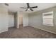 Spacious bedroom with walk-in closet and ceiling fan at 11321 Alachua Creek Ln, Riverview, FL 33579