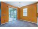 Bright dining room with sliding glass doors leading to backyard at 11321 Alachua Creek Ln, Riverview, FL 33579