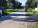 Street view of a quiet neighborhood at 6002 Christy Ln, Riverview, FL 33578