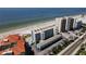 Overhead view of condos with a swimming pool, close to the beach and ocean at 19440 Gulf Blvd # 201, Indian Shores, FL 33785