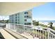 Balcony view of the ocean, beach and building at 19440 Gulf Blvd # 201, Indian Shores, FL 33785