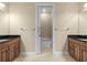 Double vanity bathroom with a large soaking tub at 11516 Bellamar St, Temple Terrace, FL 33637