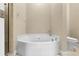 Round corner bathtub with shower access nearby at 11516 Bellamar St, Temple Terrace, FL 33637