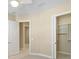 Bedroom with private bathroom access and closet at 11516 Bellamar St, Temple Terrace, FL 33637