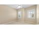 Bedroom with ceiling fan and window shutters at 11516 Bellamar St, Temple Terrace, FL 33637