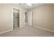 Bright bedroom with ceiling fan and walk-in closet at 11516 Bellamar St, Temple Terrace, FL 33637