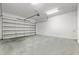 Spacious garage with overhead door and ample storage space at 11516 Bellamar St, Temple Terrace, FL 33637