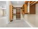 Large walk-in closet with ample shelving and hanging space at 11516 Bellamar St, Temple Terrace, FL 33637