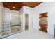 Bathroom with glass block shower and herringbone tile floor at 5455 Lake Le Clare Rd, Lutz, FL 33558