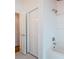 Clean bathroom with a shower/tub combo and updated fixtures at 5455 Lake Le Clare Rd, Lutz, FL 33558