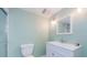 Clean bathroom with white vanity and shower stall at 5455 Lake Le Clare Rd, Lutz, FL 33558