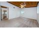 Spacious bedroom with wood flooring and ample closet space at 5455 Lake Le Clare Rd, Lutz, FL 33558