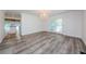 Elegant dining room featuring hardwood floors and French doors at 5455 Lake Le Clare Rd, Lutz, FL 33558