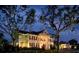 Grand clubhouse exterior at night at 4656 Southern Valley Loop, Brooksville, FL 34601