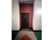 Apartment building hallway with access door at 2410 W Azeele St # 212, Tampa, FL 33609