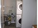 Laundry room with washer, dryer, and water heater at 2410 W Azeele St # 212, Tampa, FL 33609