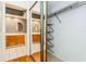 Clean bathroom with double sinks and mirrored closet at 10823 Indian Hills Ct # 32, Seminole, FL 33777