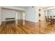 Dining area with hardwood floors and kitchen access at 10823 Indian Hills Ct # 32, Seminole, FL 33777