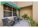 Spacious front porch with ample potted plants at 10823 Indian Hills Ct # 32, Seminole, FL 33777