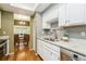 View of kitchen with stainless steel appliances and granite countertops at 10823 Indian Hills Ct # 32, Seminole, FL 33777