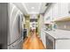 Modern kitchen with stainless steel appliances and granite countertops at 10823 Indian Hills Ct # 32, Seminole, FL 33777