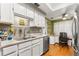 Well-equipped kitchen with stainless steel appliances and granite countertops at 10823 Indian Hills Ct # 32, Seminole, FL 33777