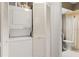 Stackable washer and dryer in a laundry closet at 10823 Indian Hills Ct # 32, Seminole, FL 33777