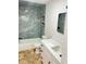 Modern bathroom with updated fixtures and bathtub at 701 S Oakwood Ave, Brandon, FL 33511