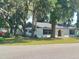 Charming single story home with a well-manicured lawn at 701 S Oakwood Ave, Brandon, FL 33511
