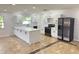 Modern kitchen featuring white cabinets and an island at 701 S Oakwood Ave, Brandon, FL 33511